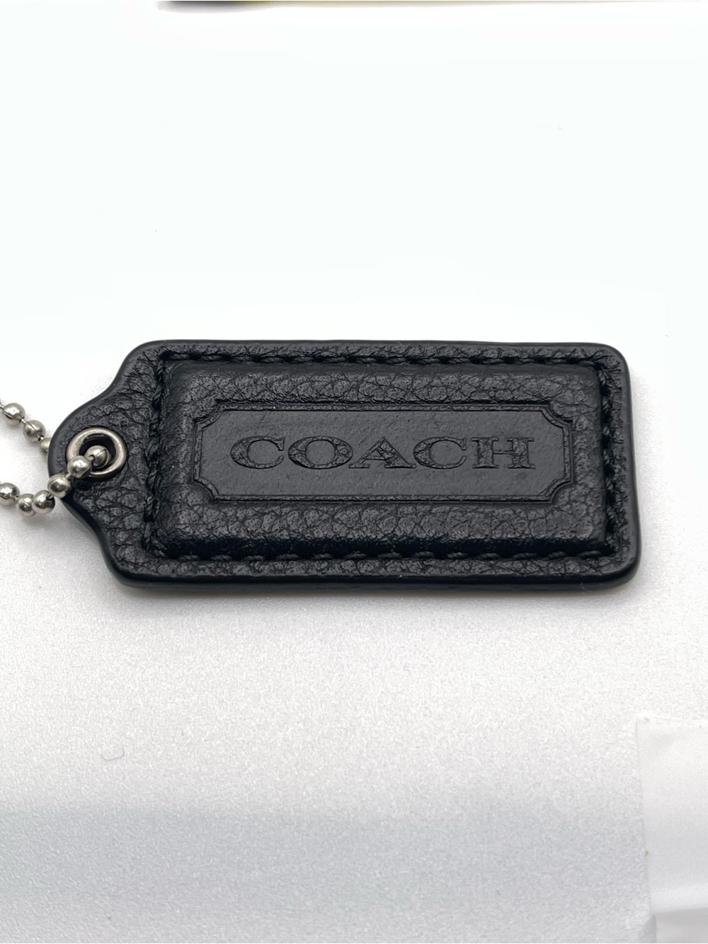 COACH Black Pebbled Leather Hang Tag